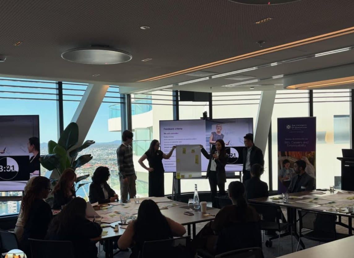 A team presenting their feedback criteria to the room